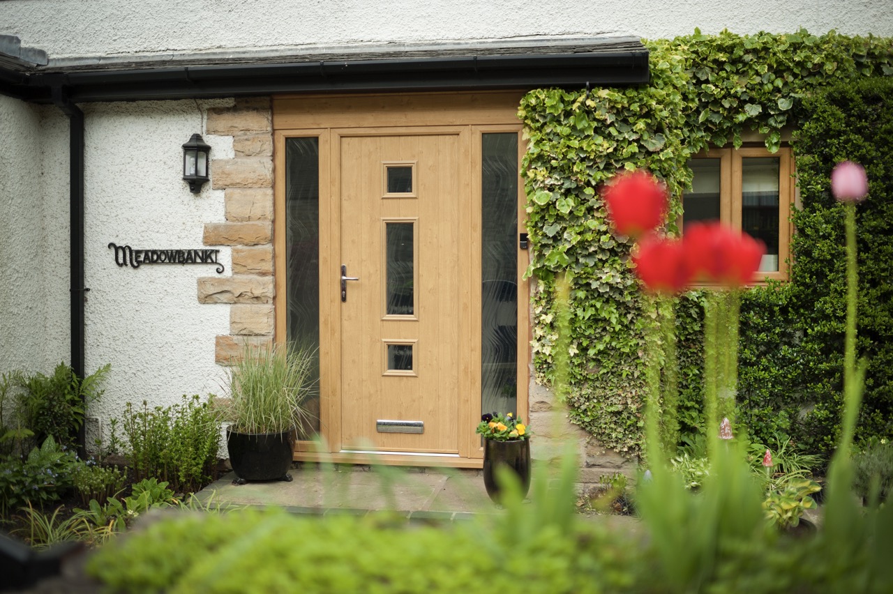 A composite exterior door fitted with a reinforced frame and a solid core for enhanced security
